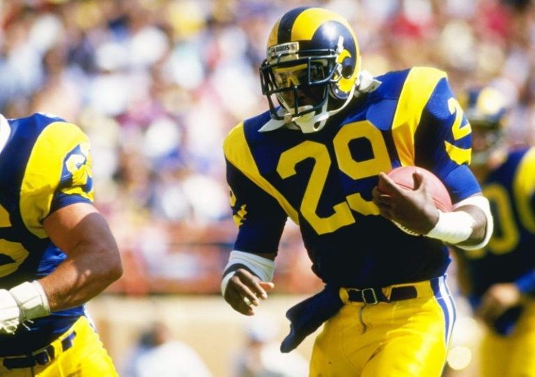 Dickerson ‘absolutely not’ pulling for Barkley in rushing record chase