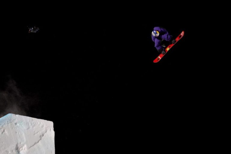 Six and a half rotations?!?! Snowboarder, skier land historic 2340s