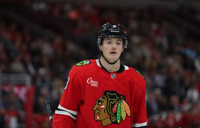 Blackhawks hang on to top goal scorer; Rangers re-sign rugged forward