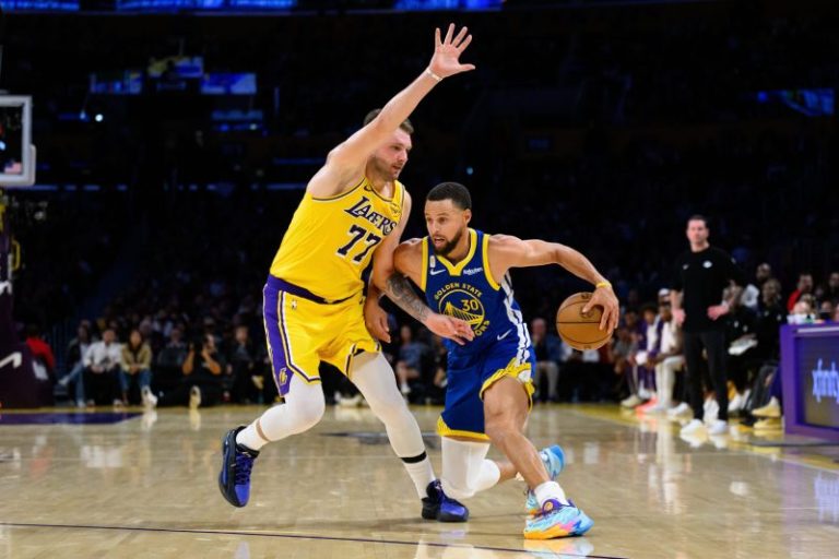 Warriors down Lakers in opener despite Doncic’s near triple-double